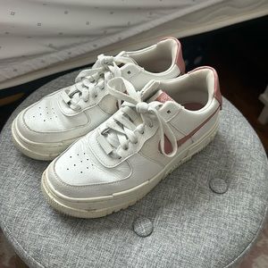 Nike Air Force 1 pixels with pink accents